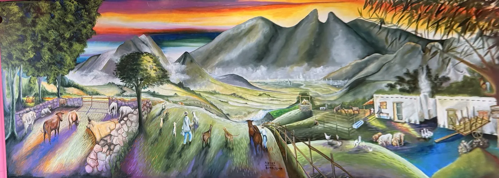 Réplica del mural pintada en la pared de la Taquería La Mexicana: la misma sierra y el mismo caserío blanco del óleo, repintados con pastizal, ganado y un cielo de atardecer